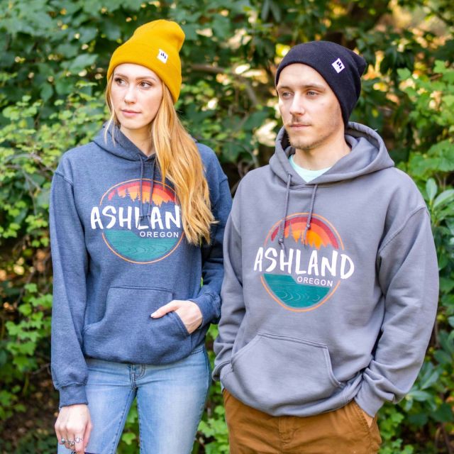 couple wearing Ashland, Oregon sweatshirts and beanies from Simply Ashland shop